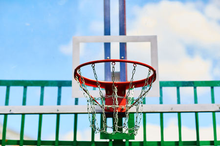 Basketball Hoop outside on the Playground. Close up. Basketball. Street game