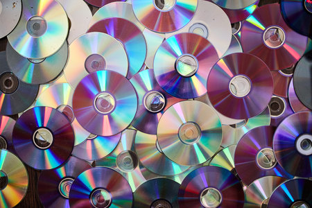DVD and CD background. Old information disks.