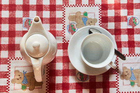 The Time of Tea Break. Cup of tea on the table. A Cup of freshly brewed black tea,escaping...
