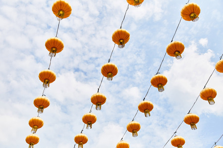 Bright yellow Chinese lanterns on the street of Singapore.の写真素材