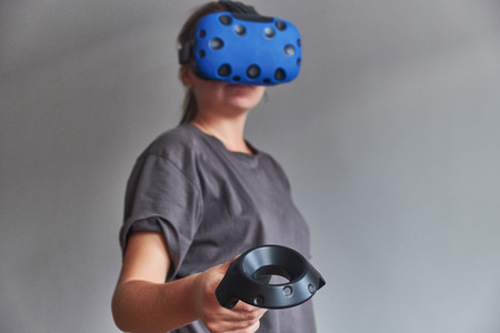 The girl in the glasses of virtual reality.の写真素材