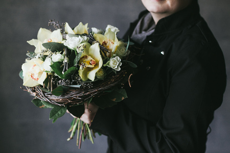 Beautiful bouquet of flowers in the hands of a woman.の写真素材