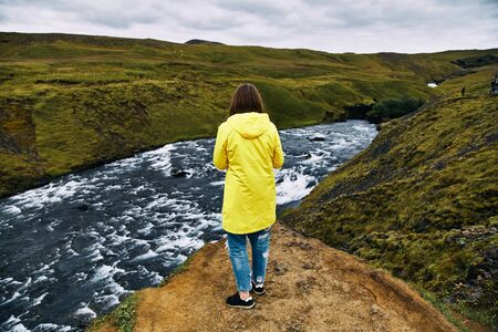 Iceland, Europe: aerial view of the upper fall of Skogafoss waterfall, the famous tourist attraction situated on the Skoga River, at the cliffs of the former coastline, in the south of the islandの写真素材