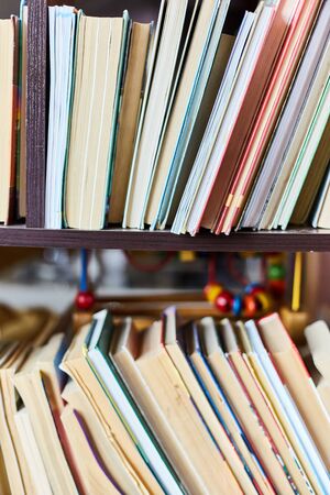 Books are in the bookcase in the home library.の写真素材