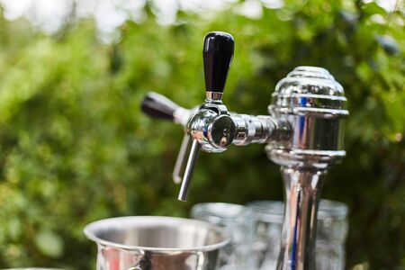 Silver beer dispenser close up. Liquid dispenser.の写真素材