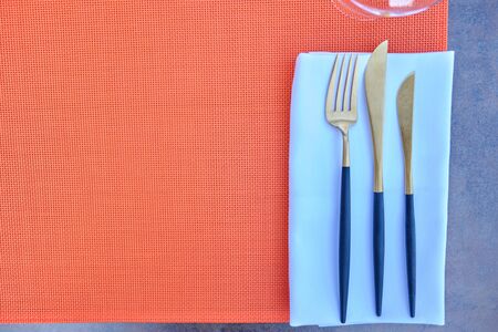 A set of tableware close up. Fork and knives.の写真素材