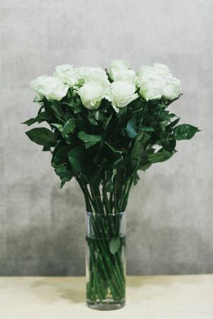 A bouquet of large white roses close up.の写真素材