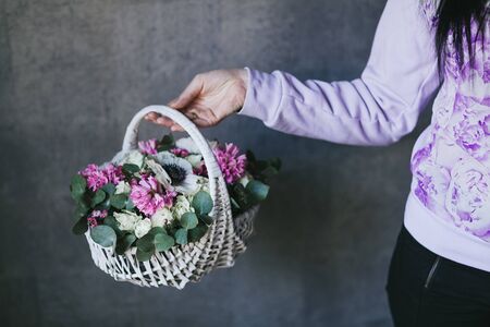 Beautiful bouquet of flowers in the hands of a woman.の写真素材
