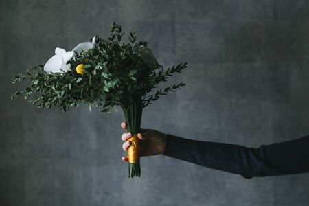 Beautiful bouquet of flowers in the hands of a woman.の写真素材