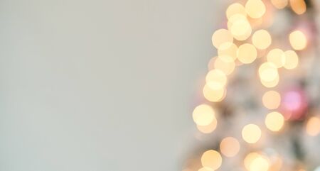 Christmas Tree Lights and Decoration Bokeh Blurred Out of Focus Background.の写真素材