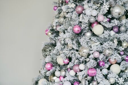 Christmas tree with New Year s balls and a garland. Copy text.の写真素材