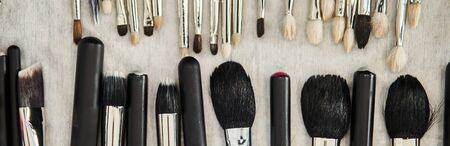 Black Makeup Brushes with Natural Pile. Set of Professional brushes for the makeup artist. Banner.