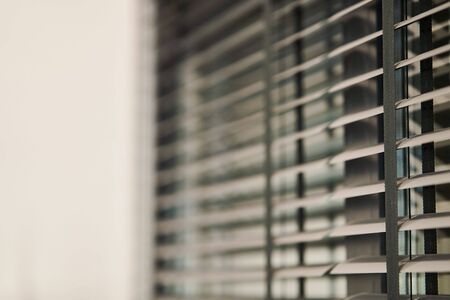 Gray plastic window blinds, close-up. Blinds Detailsの写真素材