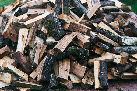 Chopped logs for a bath furnace. Logs for kindling a fire.