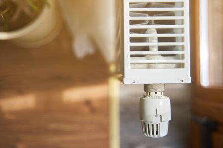 Radiator in the apartment. White heated battery.の写真素材