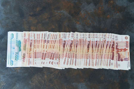 Money on Russia. Close-up of Russian rubles on five thousand and one thousand banknotes. Finance concept.の写真素材