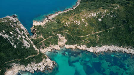 Aerial view of Porto Timoni beach and pirate bay on Corfu island in Greeceの写真素材