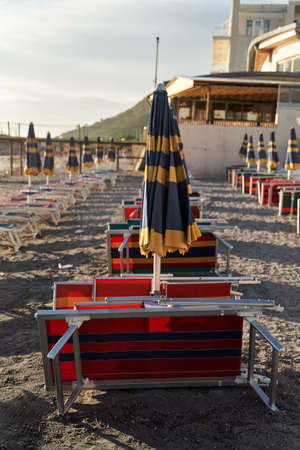 Empty sun beds on the beach during a pandemic coronavirus. Deserted beach in Durres, Albaniaの写真素材