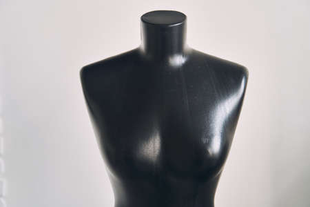 Black female mannequin for clothing on white backgroundの写真素材