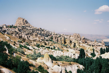 Cappadocia landscape. Stone cave houses in Cappadocia, Turkey. Grainy film in the style of old photosの写真素材