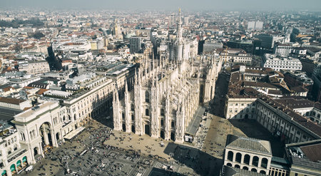 Aerial view of Piazza Duomo in front of the gothic cathedral in the center. Drone view of the...