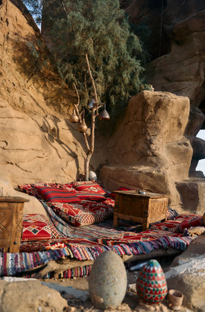 A Traditional Textile Setup Perfectly Positioned Amidst a Stunning Natural Rock Formationの写真素材
