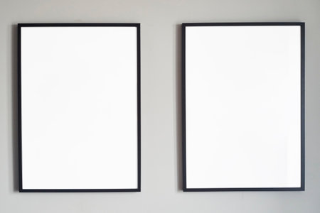 Blank frames on a wall create an ideal backdrop for artistic displays, enhancing decorの写真素材