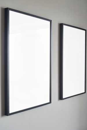 Blank frames on a wall create an ideal backdrop for artistic displays, enhancing decorの写真素材
