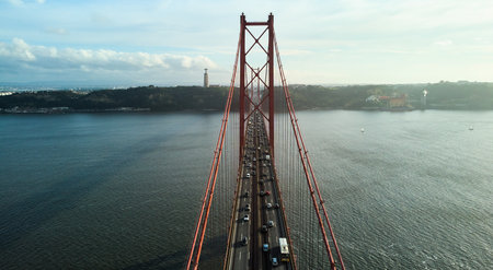Aerial view of 25th April Bridge in Lisbon, Portugal. Famous landmark on river Tagus.の写真素材