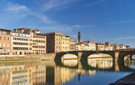 View of the river Arno and buildings from the embankment in Florenceの写真素材