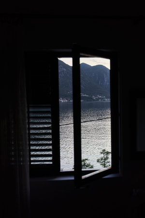 Open window with sea and mountain view in Kotor, Montenegro