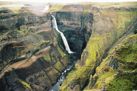 Top view of Icelandic huge waterfall called Haifoss. Grainy film in the style of old photosの写真素材