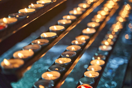 Many candles burn in a temple in Vienna. High quality 4k footageの写真素材