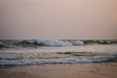 Sunset on the ocean with big waves