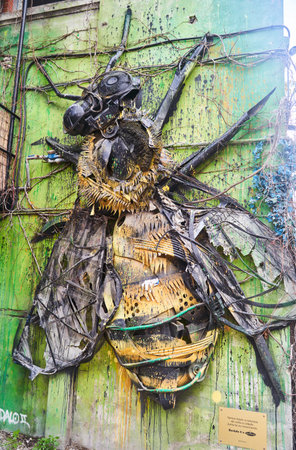 Lisbon, Portugal - 29.12.2022: Stunning Street Art Featuring a Giant Bee Mural Adorning an Urban Wall in the Cityscapeのeditorial素材