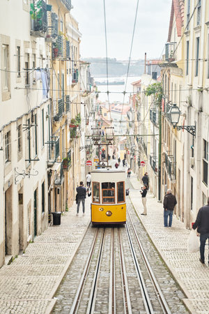 Lisbon, Portugal - 29.12.2022: Enjoy a delightful and charming ride on the tram through the historic streets of Lisbon Cityのeditorial素材