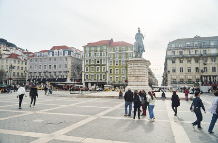Lisbon, Portugal - 29.12.2022: The Vibrant Plaza featuring a Historic Statue located in beautiful...