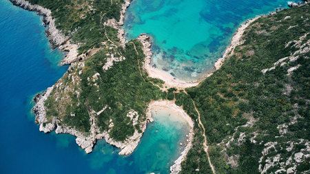 Aerial view of Porto Timoni beach and pirate bay on Corfu island in Greece