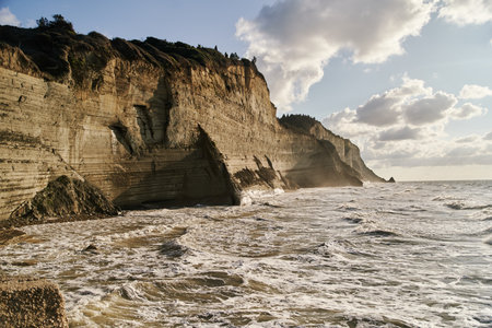 View of Logas Beach and the amazing rocky cliff in Peroulades. Corfu island. Greeceの写真素材