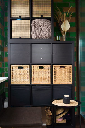 Wicker boxes for things on the shelves. Wardrobe for storage of things