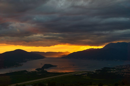 View of the Tivat Bay and the airport runway. Sunset in the Tivat Bay