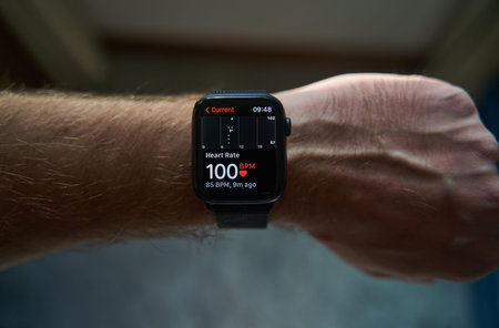 Belgrade, Serbia - 06.09.2022: A square smartwatch on a mans hand close up. Heart rate measurement on watch