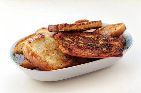 Fried bread into oblong plate - side viewの写真素材