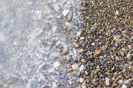 Beach stone background with seaの写真素材