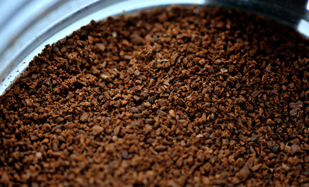 Brown Grinded coffee in bottom of cupの写真素材