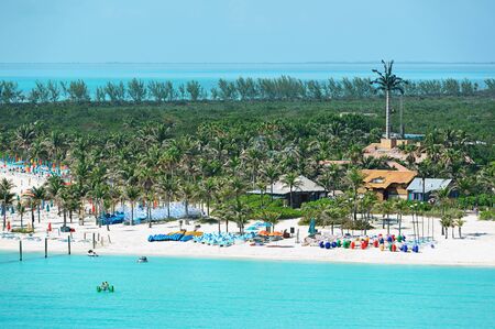 People on white sand beach in Bahamasの写真素材