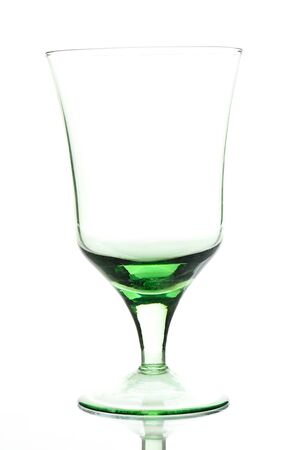 Empty glass staying on a white backgroundの写真素材