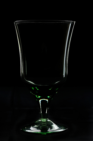 silhouette of glass on a black backgroundの写真素材