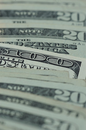 100 dollars close up between 20 dollars bills