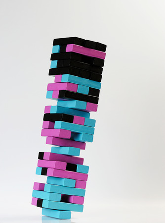 jenga fall color tower on white backgroundの写真素材